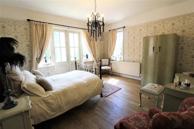 There are two bedrooms on the ground floor and a large double bedroom with en-suite on the first floor.