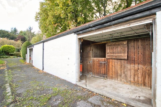 An outbuilding has been converted into two stables.