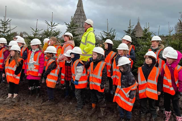 Pupils from St Paul's RC Primary School helped to plant Christmas trees at Lilidorei, the gigantic play village under construction at The Alnwick Garden.