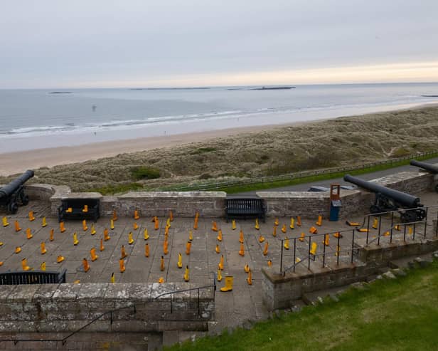 146 yellow RNLI wellies were arranged at Bamburgh Castle to celebrate the 146,000 lives saved by the charity since it was founded 200 years ago - each one represents 1,000 people saved. Pictures and video: North East Drone Studio.