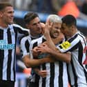 Newcastle United celebrate Bruno Guimaraes' second against Brentford. (Photo by Stu Forster/Getty Images)