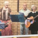 Susan Swanston, her husband, sister and sister-in-law perform at a previous variety show.