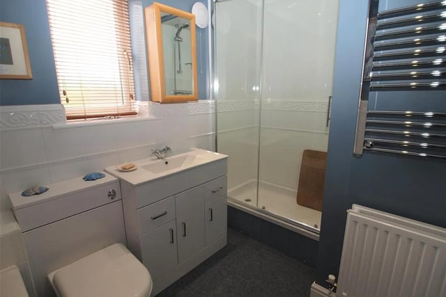 The property features a generously sized family bathroom, two en-suite bathrooms and a ground floor w/c.