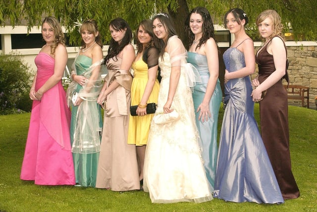 Girls line up to pose for the photographer at the Coquet High School 2007 prom.