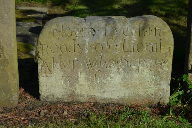 The gravestone of Lionil Alder who died in the 1700s.