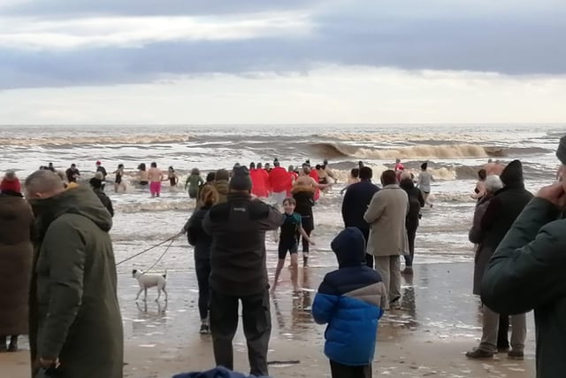 A round of applause for these hardy souls taking a bracing dip in the sea at Alnmouth on New Year's Day.