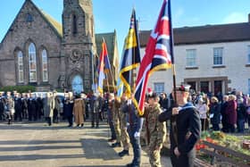Standards raised at a Berwick remembrance service in 2021. Picture by Ian Smith.
