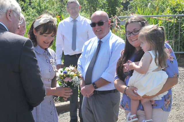 A floral bouquet was presented to the Duchess of Northumberland.