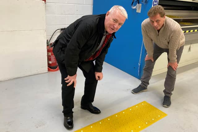 Wansbeck MP Ian Lavery and David Wagstaff, I-Glo director, with one of their products to help the visually impaired.