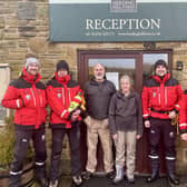 Members of the North of Tyne Mountain Rescue Team with Phil and Sue Humphreys, site managers at Herding Hill Farm.