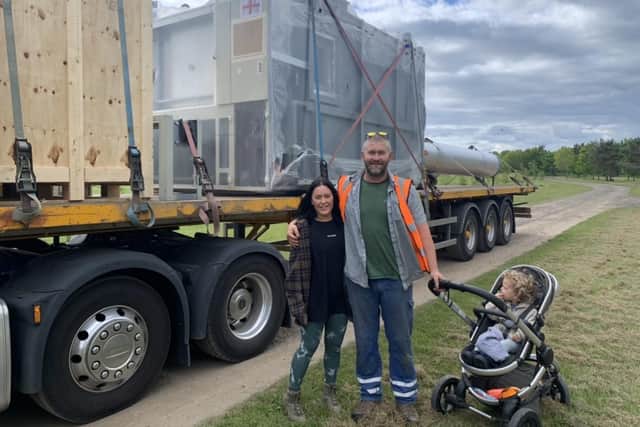Scott and Laura Clarehugh take delivery of the new cremator at Northumbrian Woodland Burials.