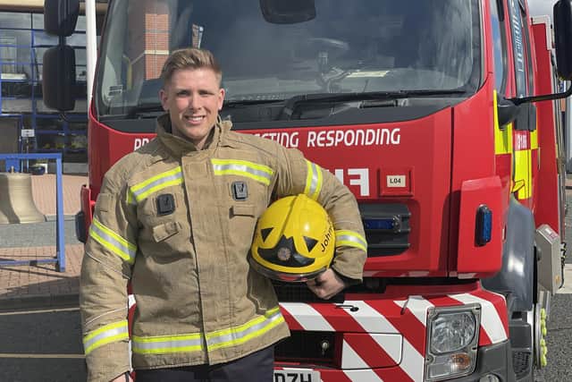 Rhys Johnstone is fulfilling his dream of being a firefighter. (Photo by TWFRS)