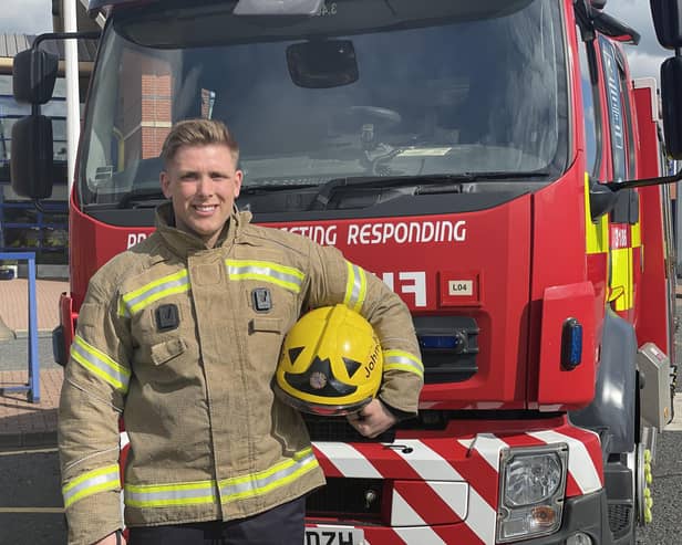Rhys Johnstone is fulfilling his dream of being a firefighter. (Photo by TWFRS)