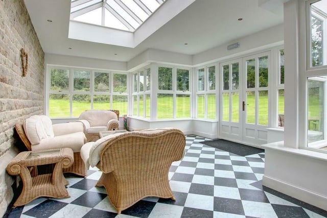 A south facing orangery with underfloor heating and French doors leading to the sun terrace and garden.