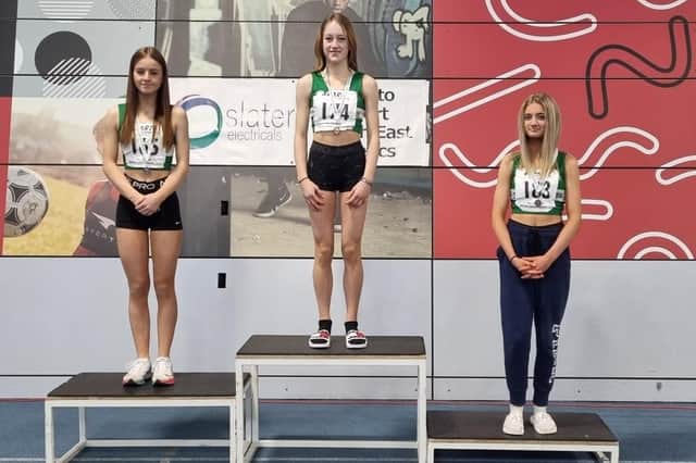 Blyth atletes on the podium at the National Indoor Championships.