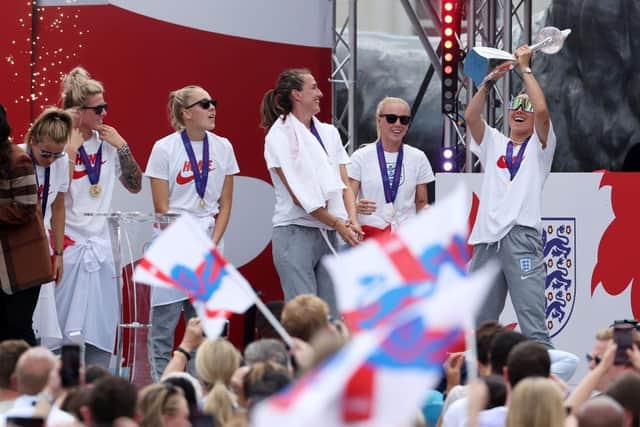 Lucy Bronze, right, left the Euro 2022 trophy during the England team celebrations at Trafalgar Square. (Photo by Warren Little/Getty Images)