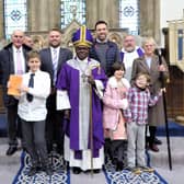 The former Archbishop of York, Lord Sentamu (front, centre) visited All Saints Church in Rothbury. Picture: Jeff Reynalds