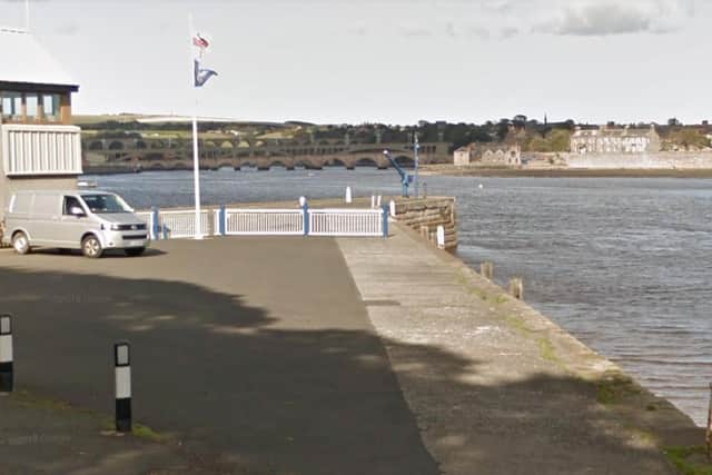 The RNLI's davit - the small blue crane seen on the edge of the dock here - has been used by people to jump into the River Tweed. Image copyright Google Maps.