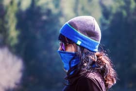 Some health chiefs have suggested wearing masks outdoors, particularly in crowded streets, to help prevent the spread of infection.
