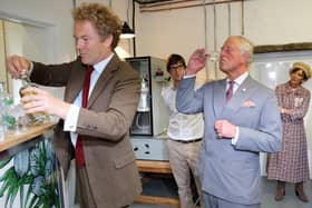 Prince Charles, then the Prince of Wales, has a small taster of Hepple Gin during a visit to the Moorland Spirit Company distillery.