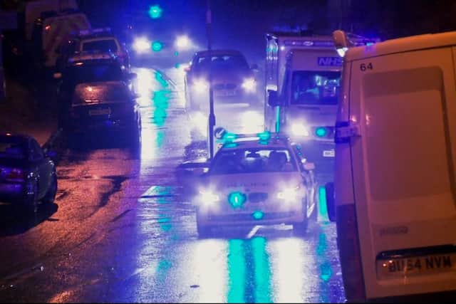 Police escort and ambulance rush to Newcastle's General Hospital with Raul Moat after he shot himself in the head