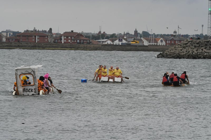 The three times fighting for victory in Saturday's raft race.