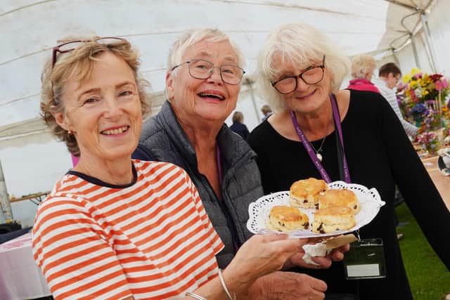 Caroline Simpson, Judy Cowen and Maggie Stenhouse cast their expert eyes over the scones at the 2019 Bamburgh Festival. Picture by Jane Coltman