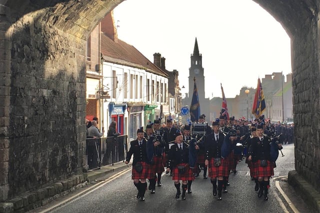 Berwick Pipe Band makes its way through the Scotsgate arch.