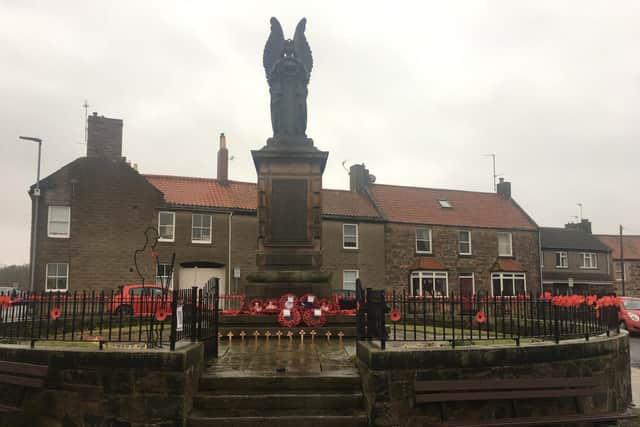 Poppy wreaths were laid at Berwick War Memorial. Photo: Alan Hughes.