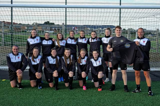 Jack Brookes of TKO Fitness, working out of Elite Fitness in Alnwick, is sponsoring the Alnwick Town Juniors Girls U16’s (Lionesses) with new training tops.