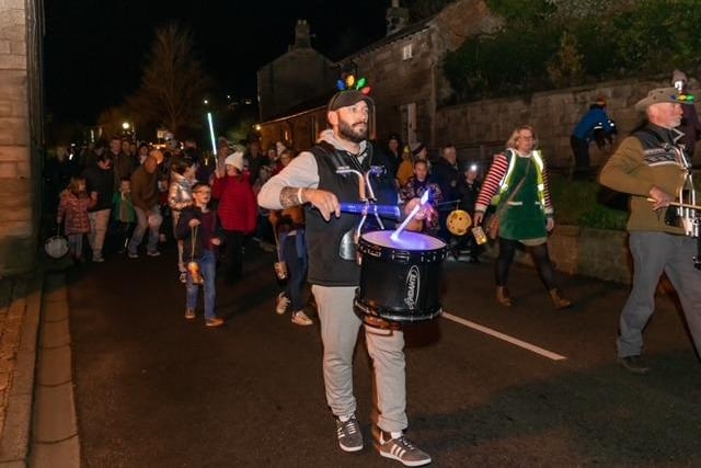 Rothbury Highland Pipe Band led the lantern parade.