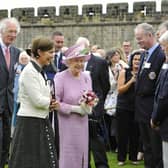 The Queen met many community groups on her 2011 visit to Alnwick including members of Morpeth Lions Club. Picture by Jane Coltman.