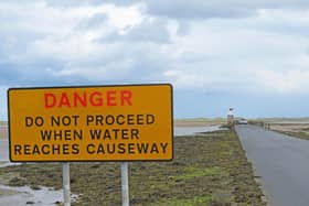 Danger sign before the Causeway leading to Holy Island.