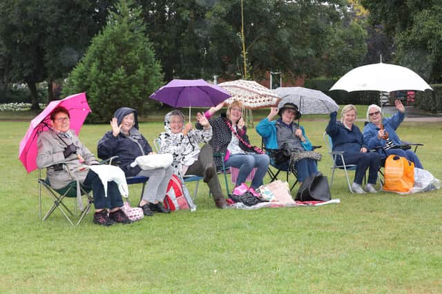 Some of the crowd braving the weather at the Blyth Proms in the Park event.