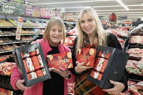 Asda Cramlington's store community champion Jackie Burt (left) handed the treats over to Maggie Martin. (Photo by Jane Coltman)