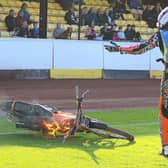 Edinburgh reserve Mickie Simpson sees his bike go up in flames at Shielfield Park on Saturday night. Picture: Taz McDougall