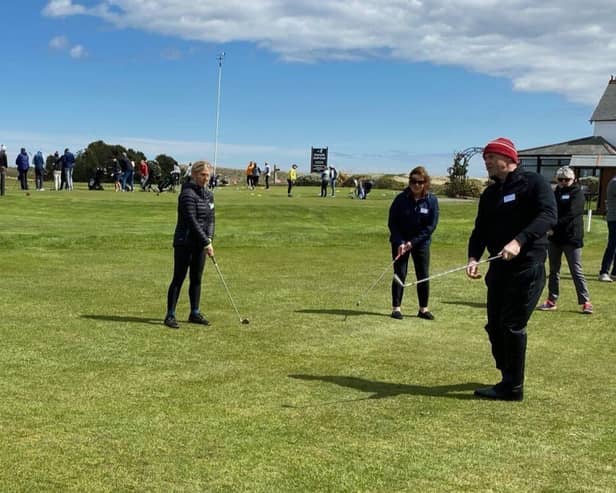 Goswick member Helen Ringland introduces girls to golf.