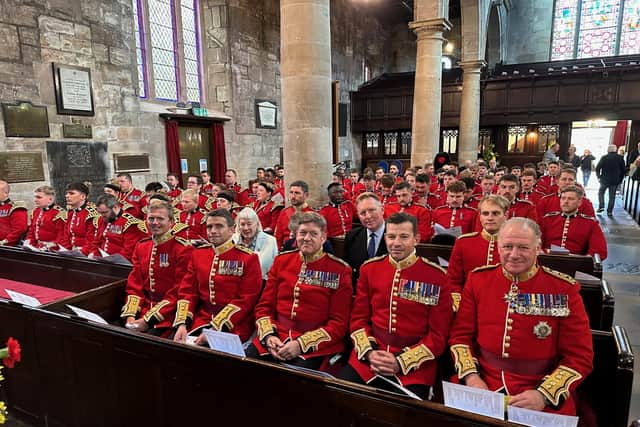 Members of the Regiment in the church service last year.