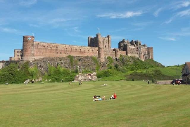 Bamburgh Castle and village green.