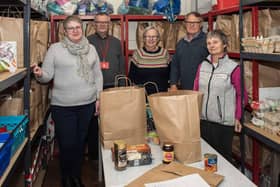 Wansbeck Valley Food Bank volunteers packing food parcels.