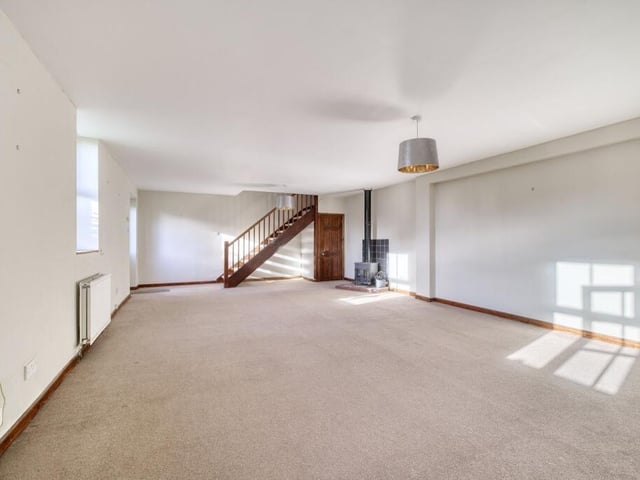 The property includes a generously proportioned living room.