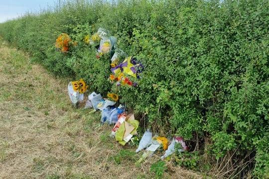 Floral tributes left at the scene of the collision in Berwick Hill.