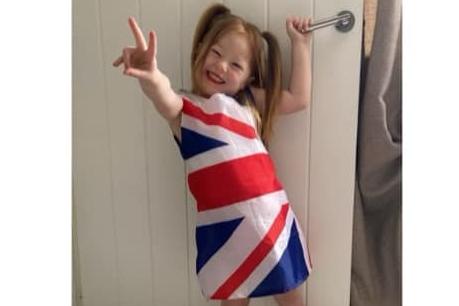 Millie shows the colours of the Union Jack in her Ginger Spice-inspired outfit.