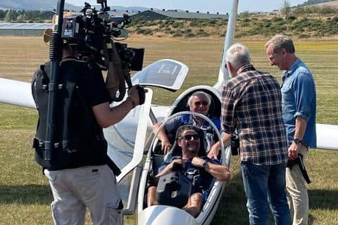 Robson Green, far right, with relatives and a film crew at Borders Gliding Club.