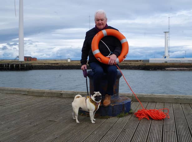 Terry Cavner (70), dog Nelly and the lifebelt he used to rescue a 73-year-old from Bedlington who had fallen into the river Blyth.