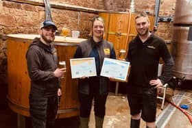 The Alnwick Brewery team with their awards.