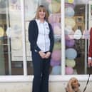 Specsavers store manager Eva Davies with Martin Peagam of Hearing Dogs for Deaf People.