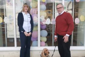 Specsavers store manager Eva Davies with Martin Peagam of Hearing Dogs for Deaf People.
