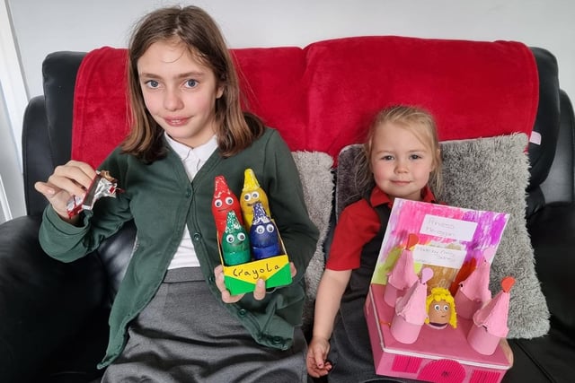 Grace Sidney, age 11, with her coloured crayons and Emily Sidney, age 3, with her princess and castle scene.
