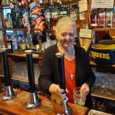 Brenda Collins behind the bar at The Free Trade Inn, Berwick.